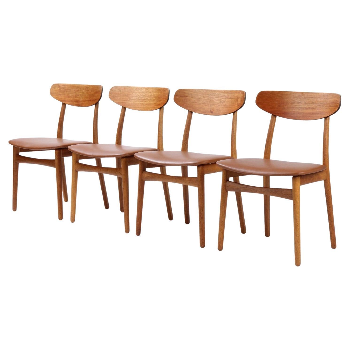 Henning Kjærnulf, Four Chairs in Teak and Oak, 1960s For Sale