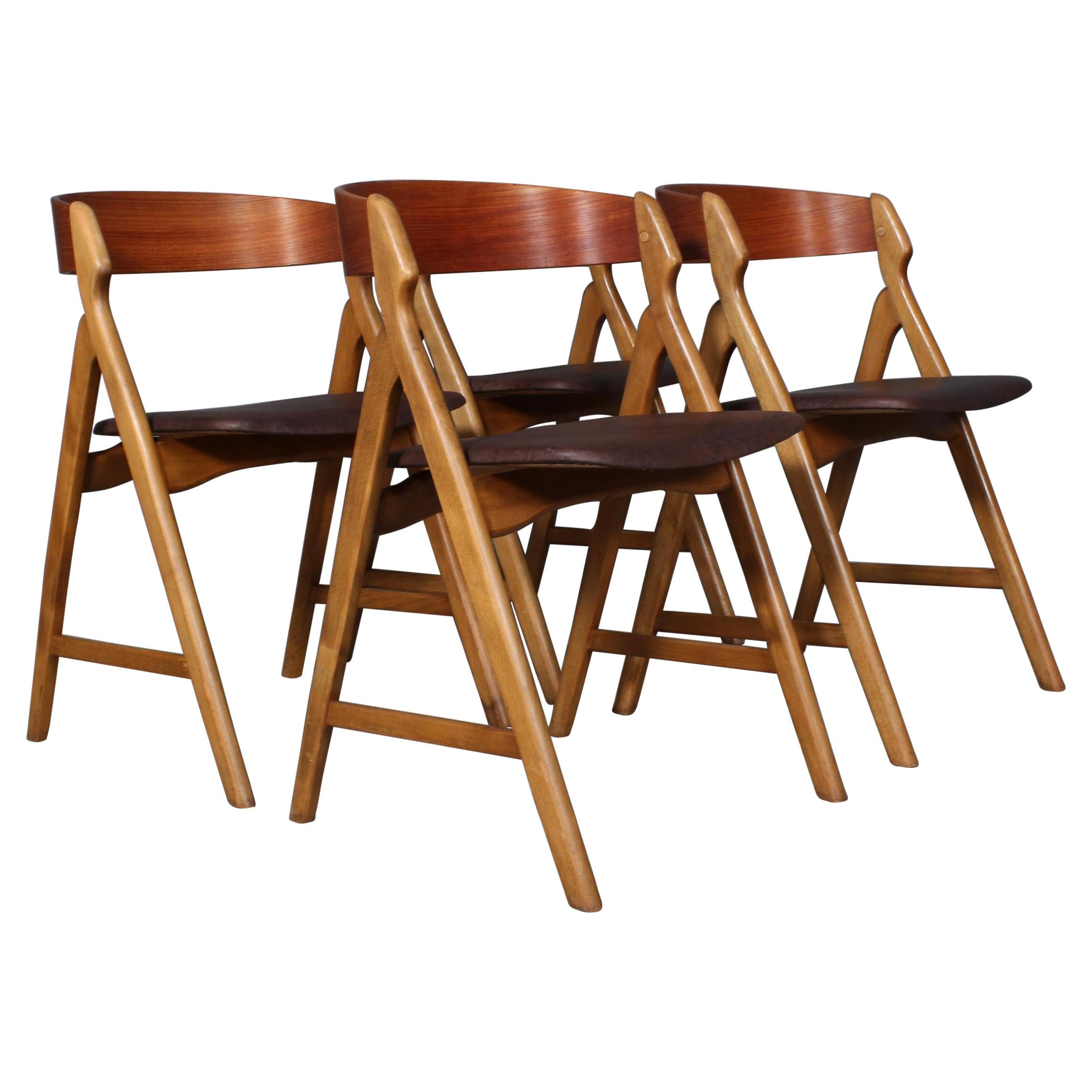 Henning Kjærnulf Four Teak Dining Chairs