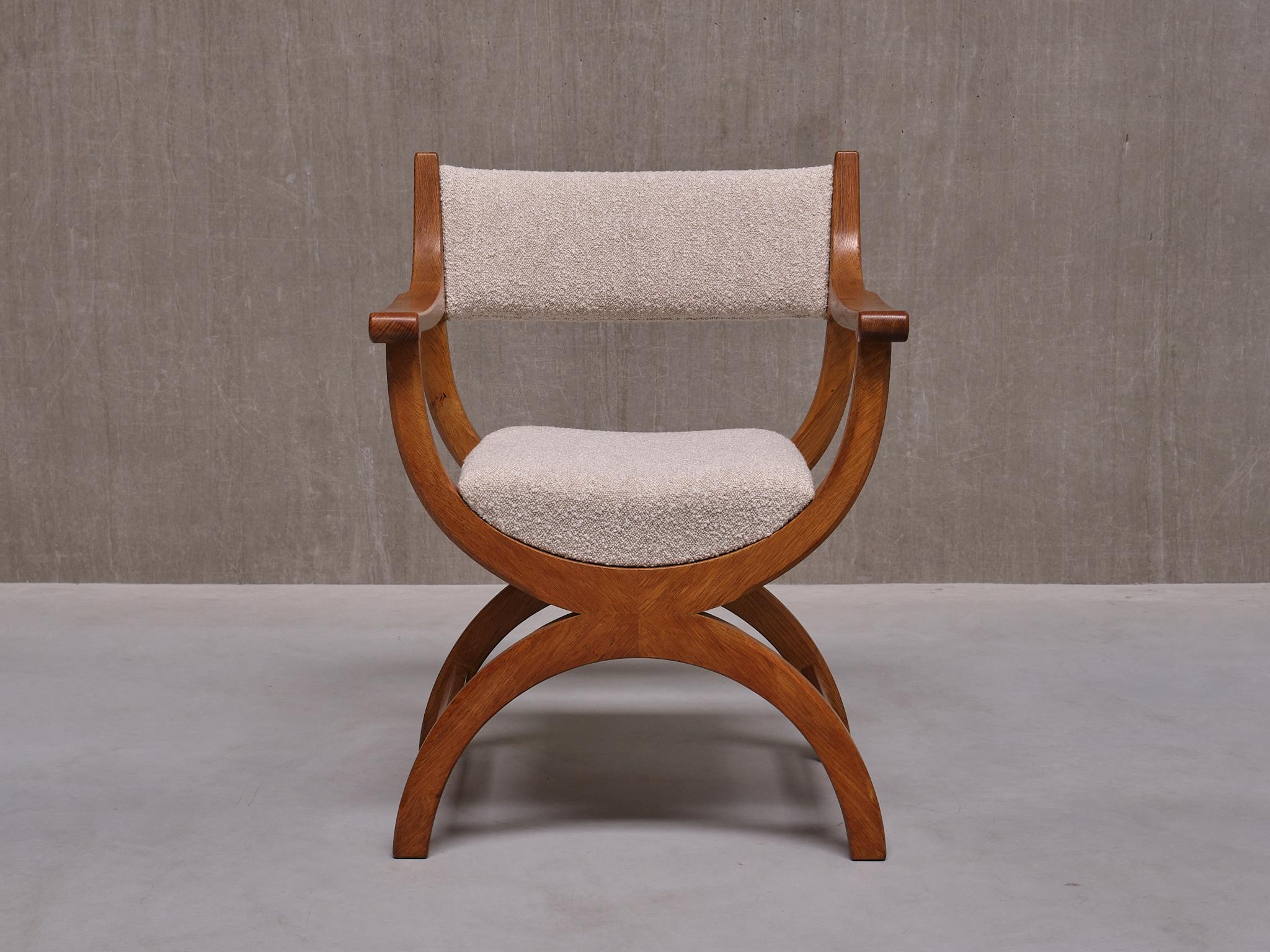 This striking armchair was designed by Henning (Henry) Kjærnulf in the 1960s. This particular model named 'Kurul' was produced by EG Kvalitetsmøbel in Denmark.

This armchair in solid oak blends the classic kurul design with rounded, curved