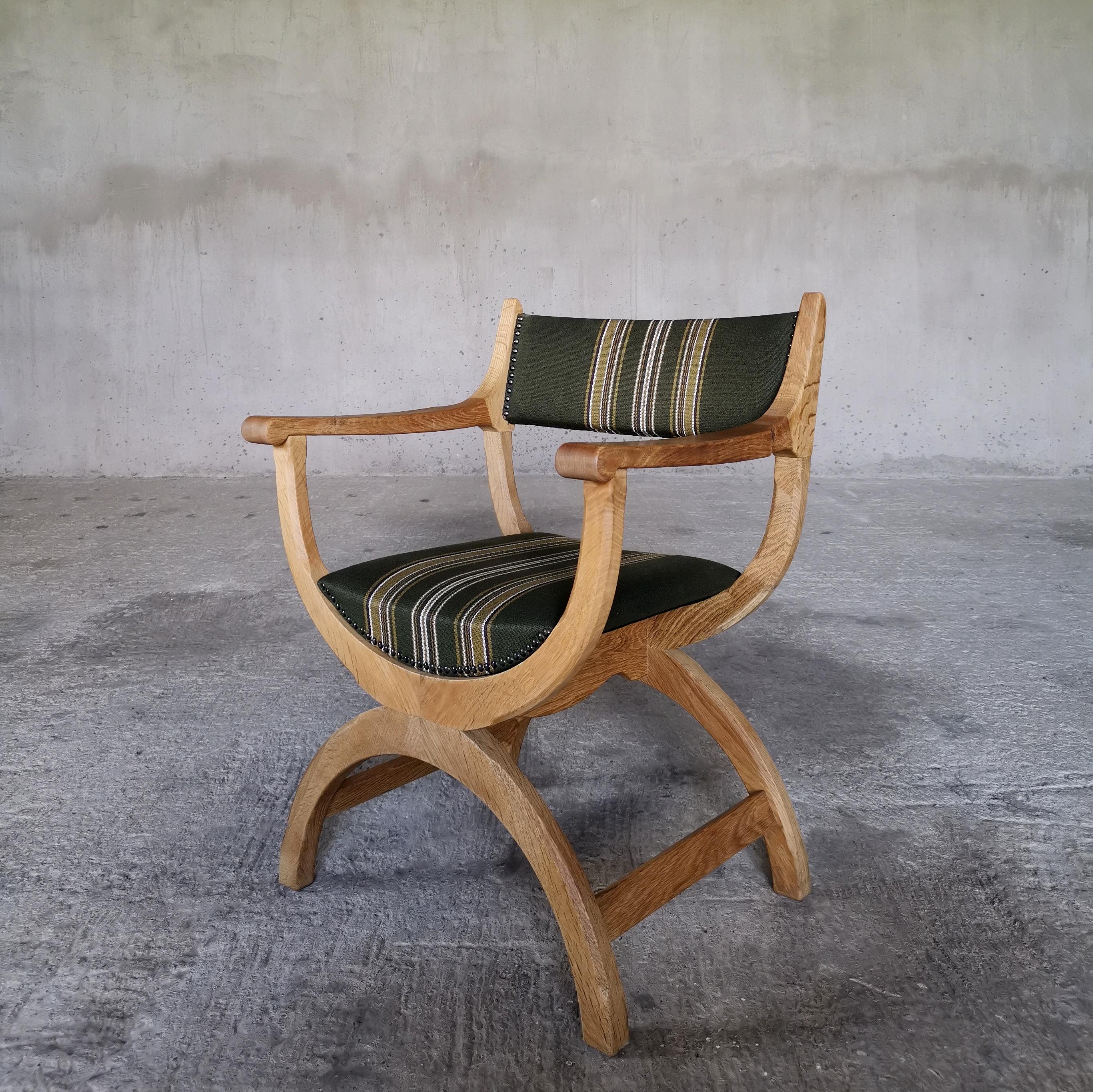 Kurul chair in solid oak. Original green striped upholstery wool in good condition, brass nails.
Design Henning Kjærnulf
Produced by EG Kvalitetsmøbel 
Denmark 1960s
Vintage condition, wear consistent with age and use. 

W: 62 cm D: 60 cm H: 84 cm