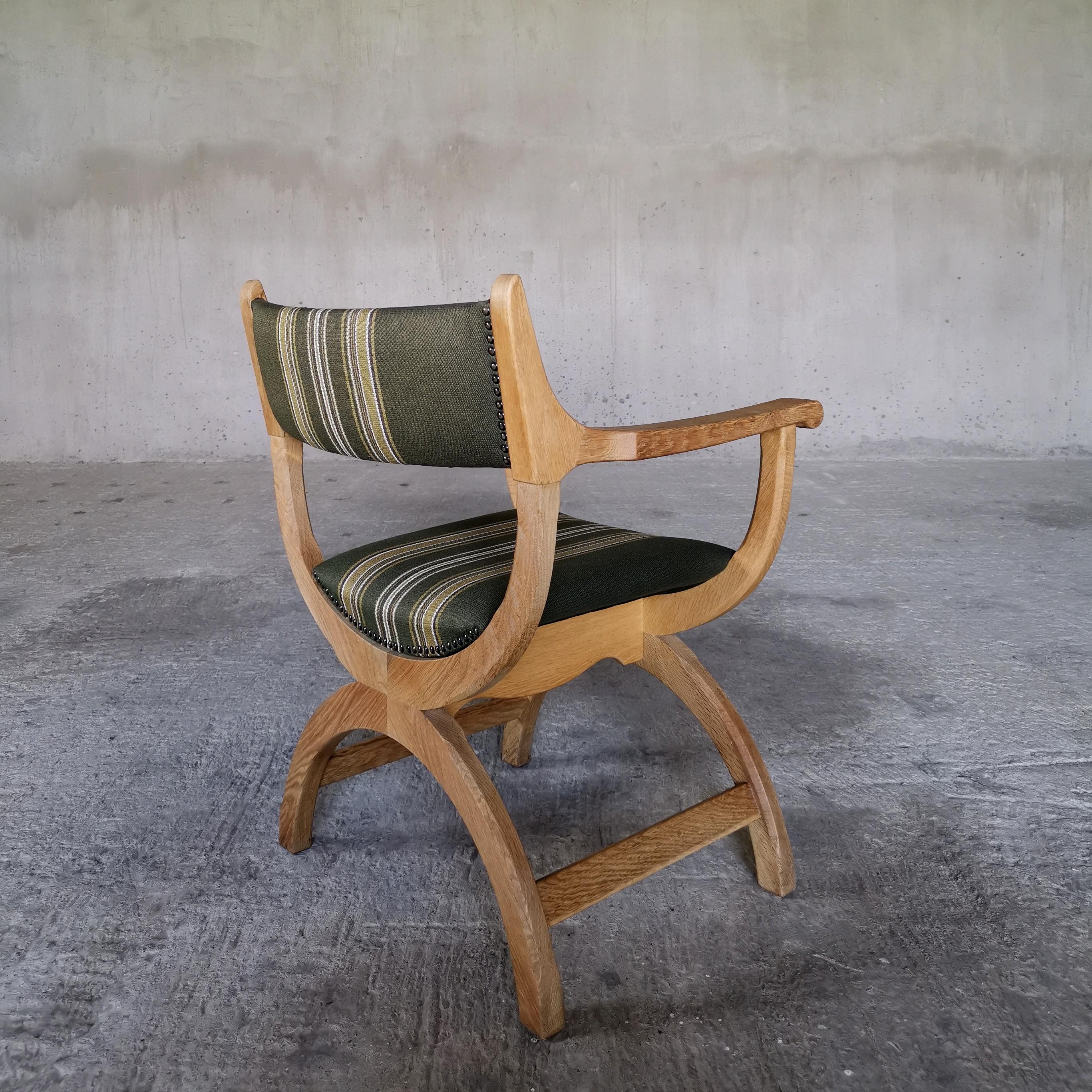 Scandinavian Modern Henning Kjærnulf Kurul chair in solid oak. EG Kvalitetsmøbel Denmark 1960s.  For Sale