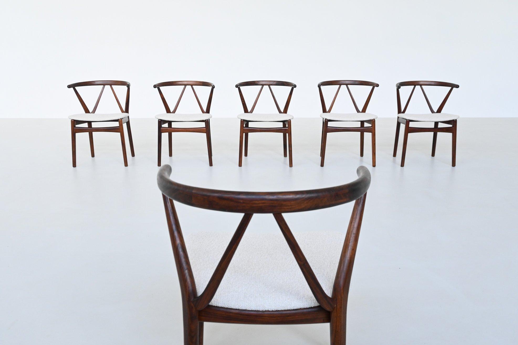 Danish Henning Kjaernulf model #255 dining chairs in rosewood Bruno Hansen Denmark 1960 For Sale