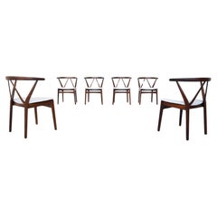 Henning Kjaernulf model #255 dining chairs in rosewood Bruno Hansen Denmark 1960