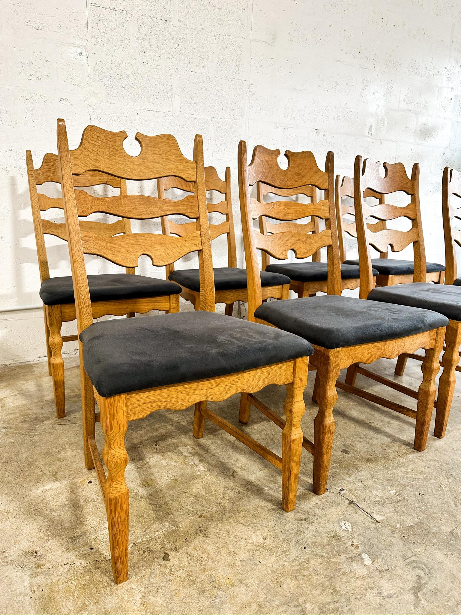 Set of 8 Razorbacks or Razorblade Dining Chairs by Henning Kjaernulf. Upgraded Suede like fabric on cushions. Dark gray.