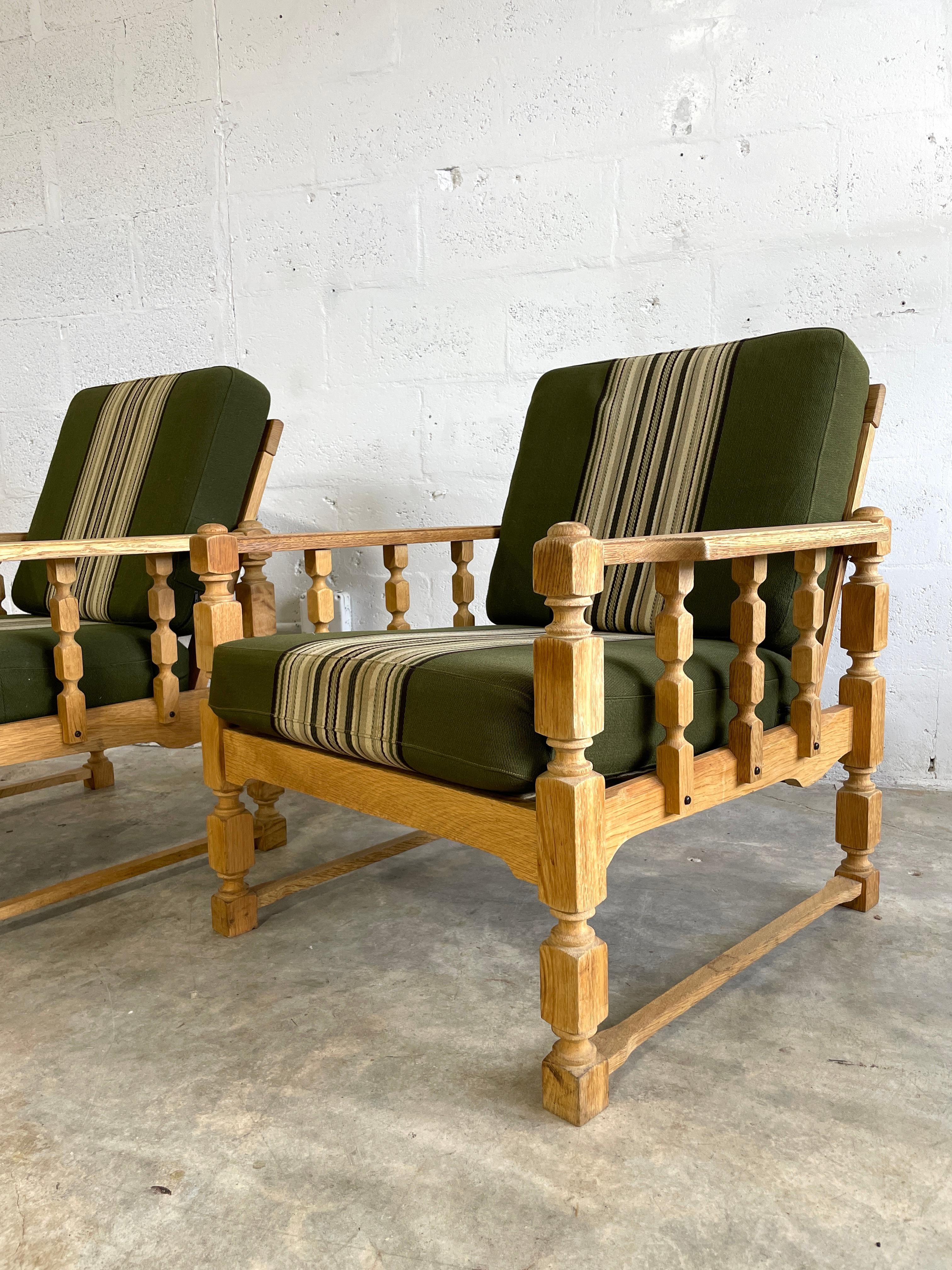 Stunning Pair of Henning Kjaernulf attrib Danish Oak Lounge Rustic Chairs. Original cushions.