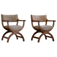 Henning Kjærnulf, Paire de fauteuils en chêne, Modèle ""Kurul"" en laine d'agneau, 1960s