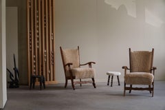 Henning Kjærnulf, Coppia di poltrone rivestite in lana d'agnello shearling, anni '50