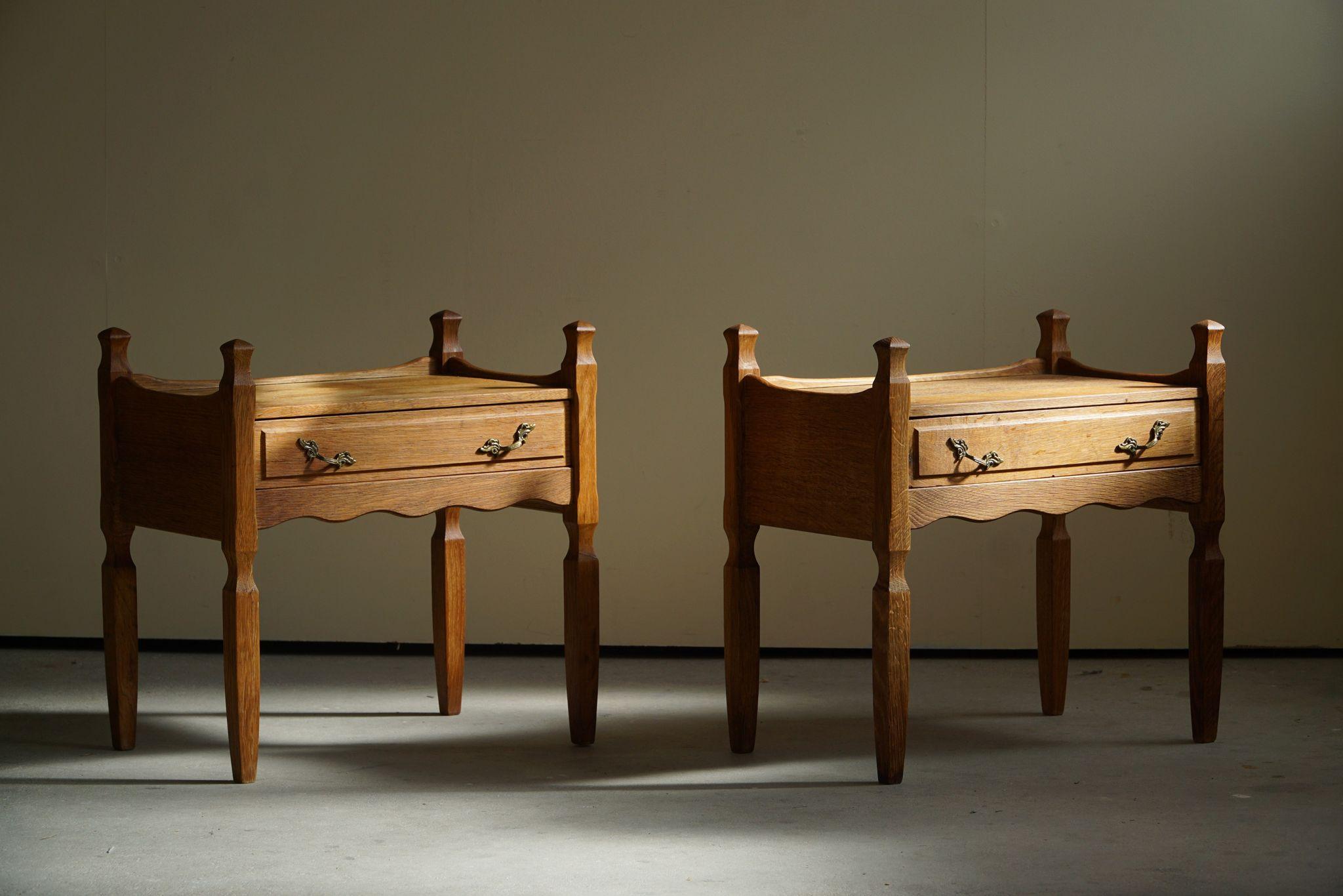 A gorgeous pair of night stands / chest of drawers in oak. Designed by Henning Kjærnulf in 1960s. Made by EG Møbler. A rare sculptural set that combine baroque style and modernism. 

This pair will complement many interior styles. A modern,