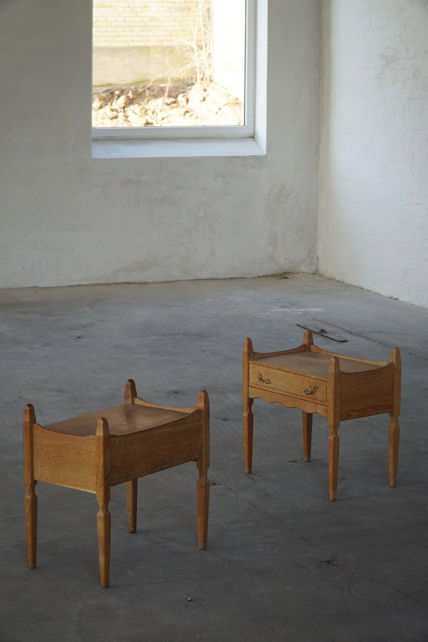 A gorgeous pair of night stands / chest of drawers in oak. Designed by Henning Kjærnulf in 1960s. Made by Nyrup Møbelfabrik. A rare sculptural set that combine baroque style and modernism. 

This pair will complement many interior styles. A modern,