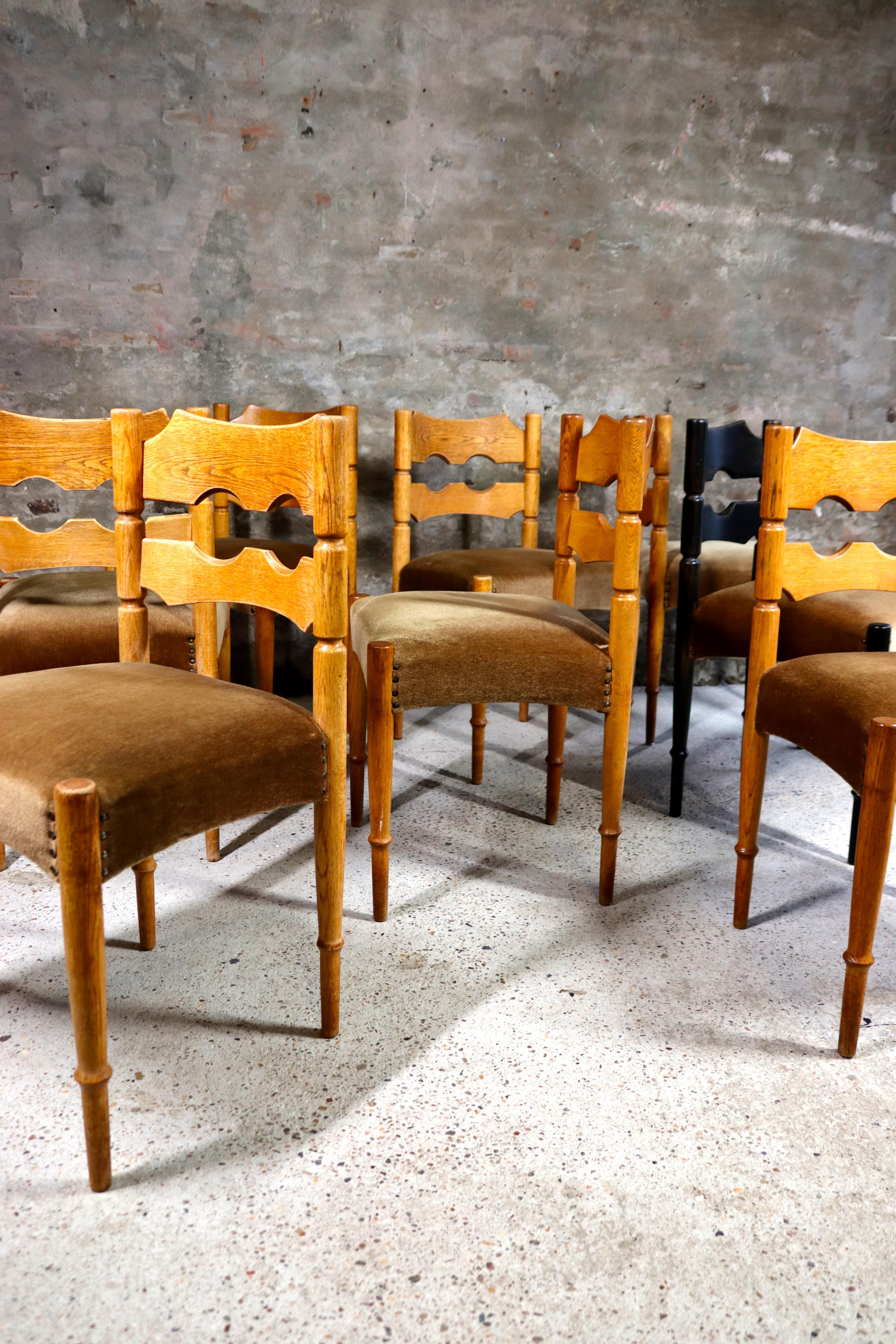 These chairs are designed by Henning Kjaernulf in the 1960s. The chairs are mostly untouched and still completely original. There are 7 normal chairs and 1 chair has been painted black. They’re all in generally good condition with signs of age. Some