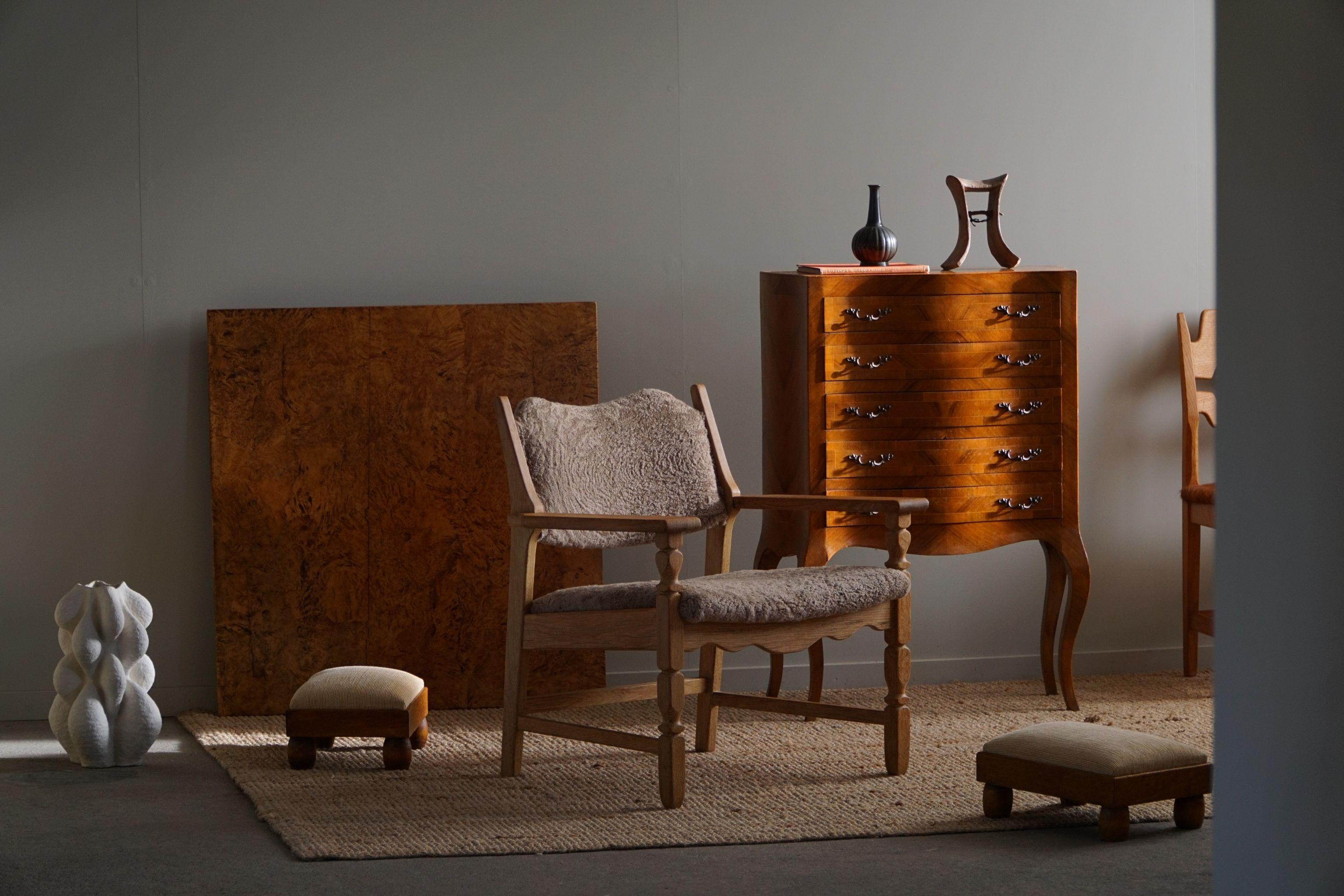 A rare lounge chair in solid oak, designed by Henning (Henry) Kjærnulf for Nyrup Møbelfabrik, Denmark 1960s. Model 