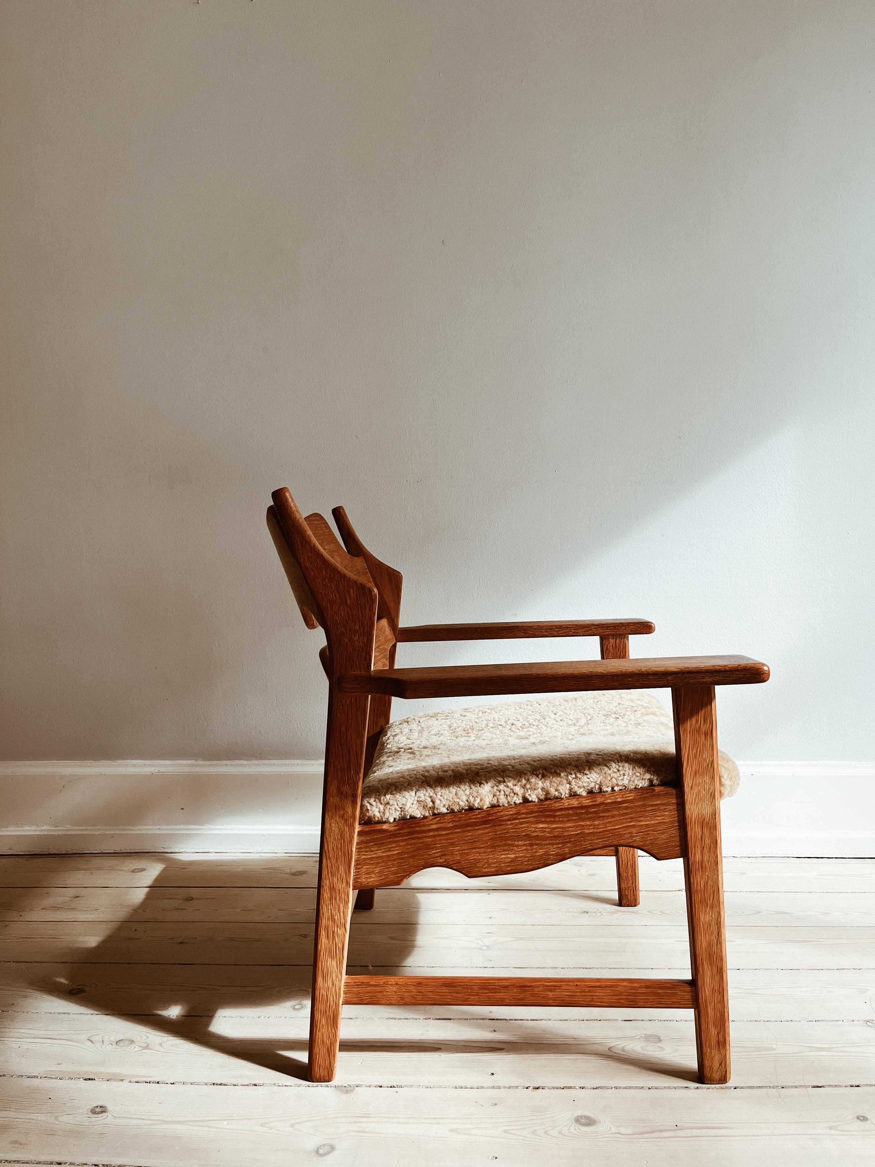 Danish Henning Kjærnulf Razorblade lounge chair reupholstered in honey colored wool