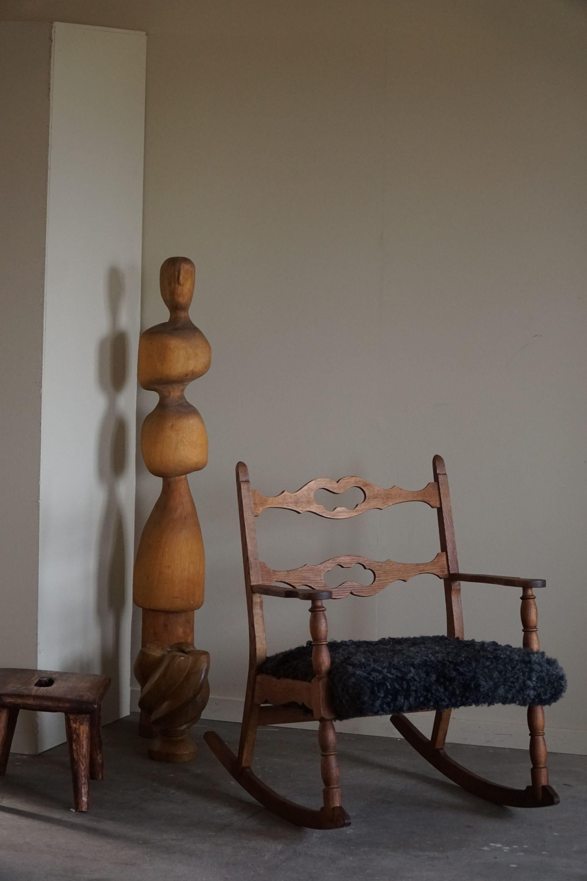 Henning Kjærnulf, Rocking Chair in Oak, Seat in Gotland Sheepskin, 1960s 8