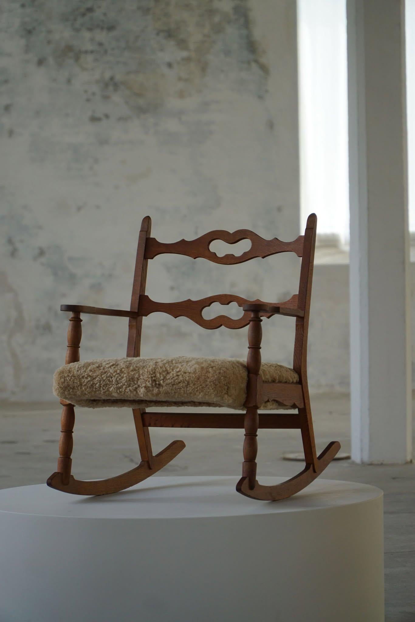 Henning Kjærnulf, Rocking Chair in Oak, Seat Reupholstered in Lambswool, 1960s en venta 5