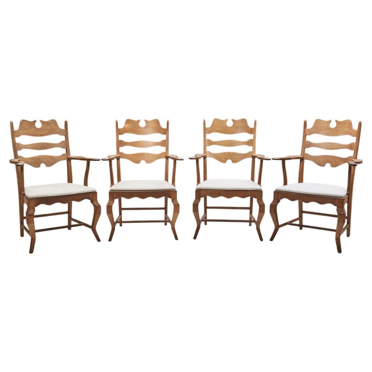This impressive mid-century dining set of four is representative of the fundamental axioms of Scandinavian design that revolve around quality and functionality and pairs it with a distinctive design.

These chairs belong to Kjærnulf’s so-called