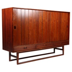 Credenza Henning Kjærnulf in palissandro. Danimarca anni '60