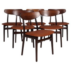 Henning Kjærnulf Six chaises de salle à manger en bois de rose