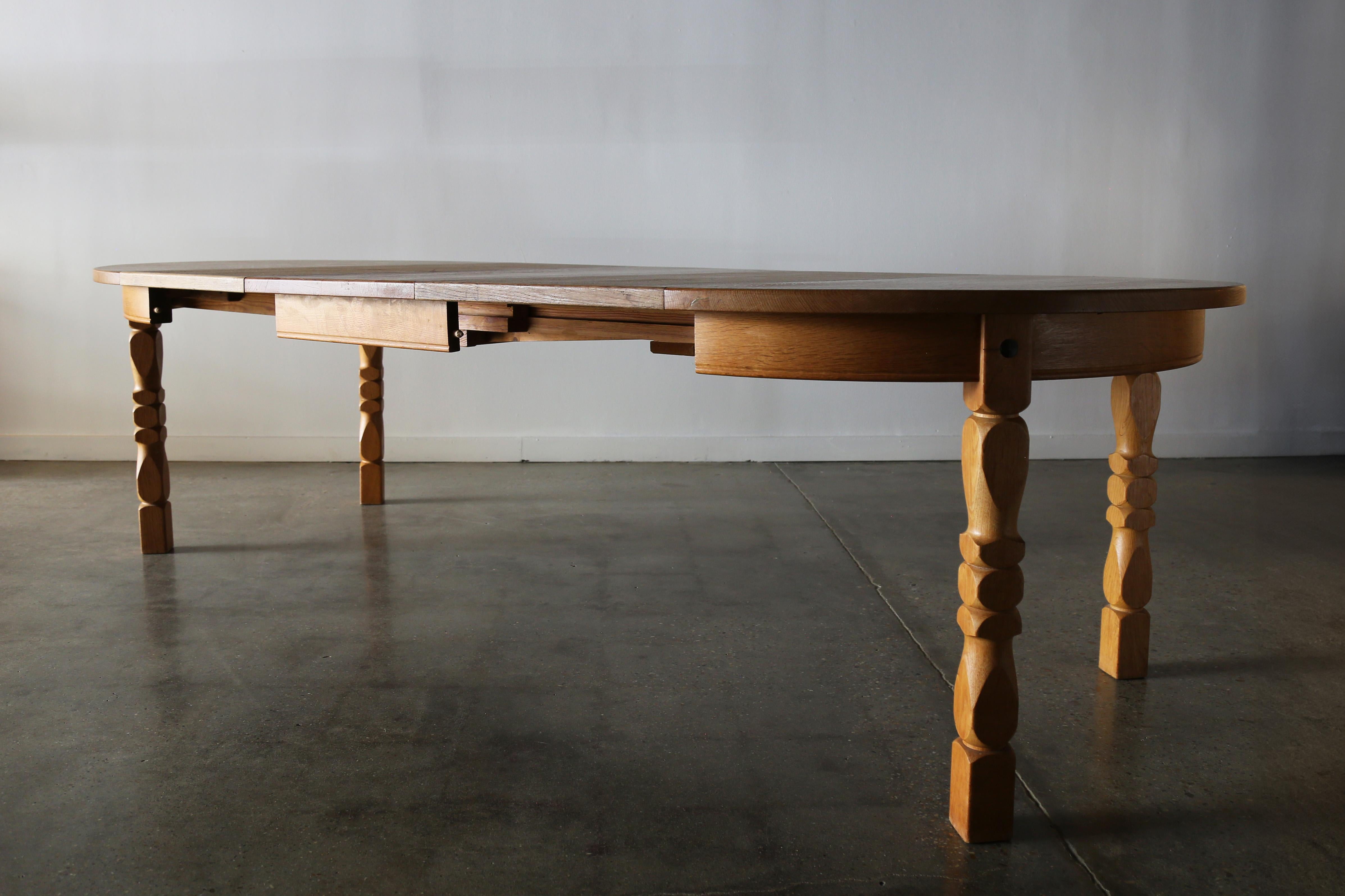 Danish Henning Kjaernulf Style Solid Oak 1970s Dining Table with 3 Leaves