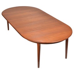 Henning Kjaernulf Teak Round Table with 3 Leaves