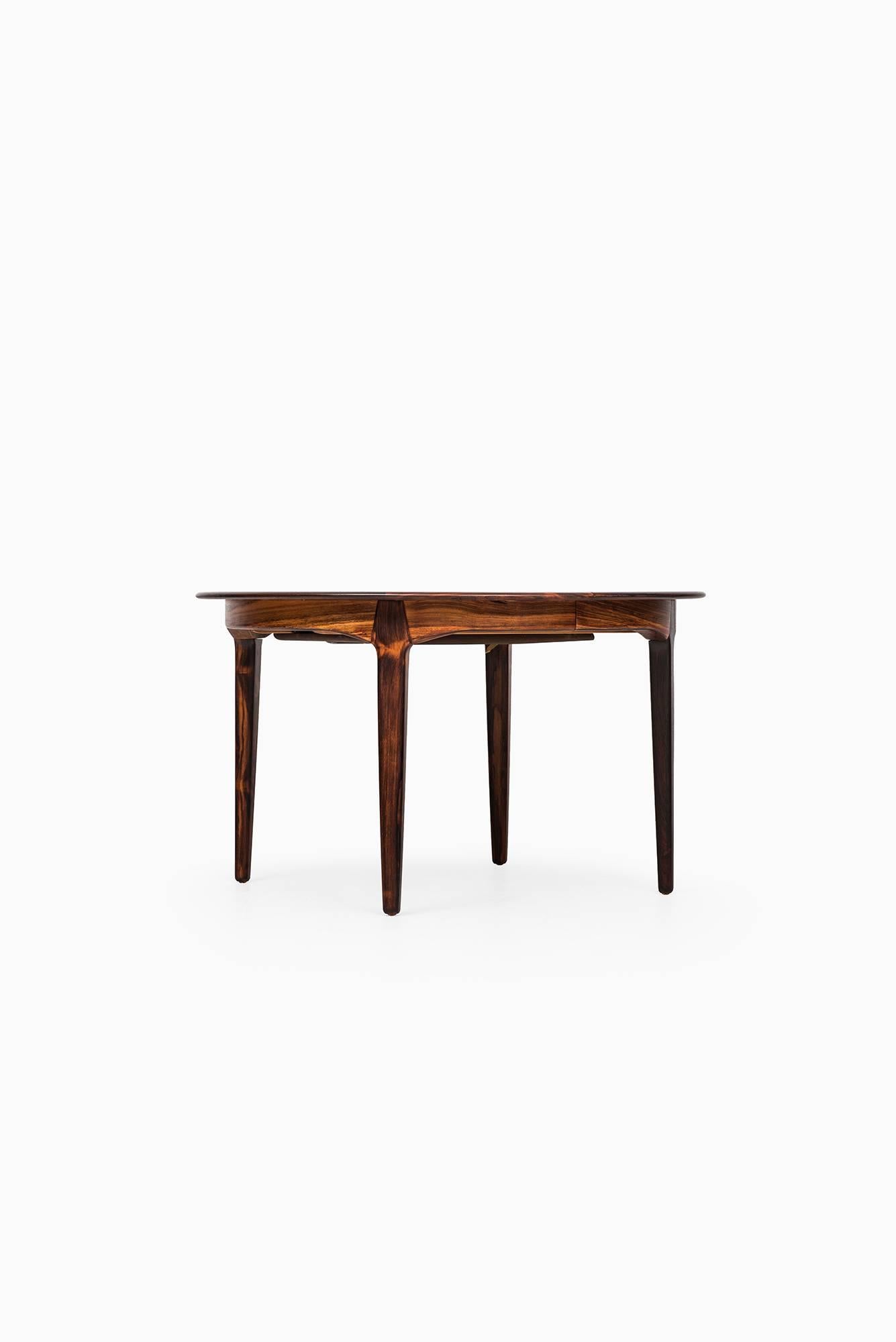 Rare big dining table model 62 designed by Henning Kjærnulf. Produced by Sorø Stolefabrik in Denmark.