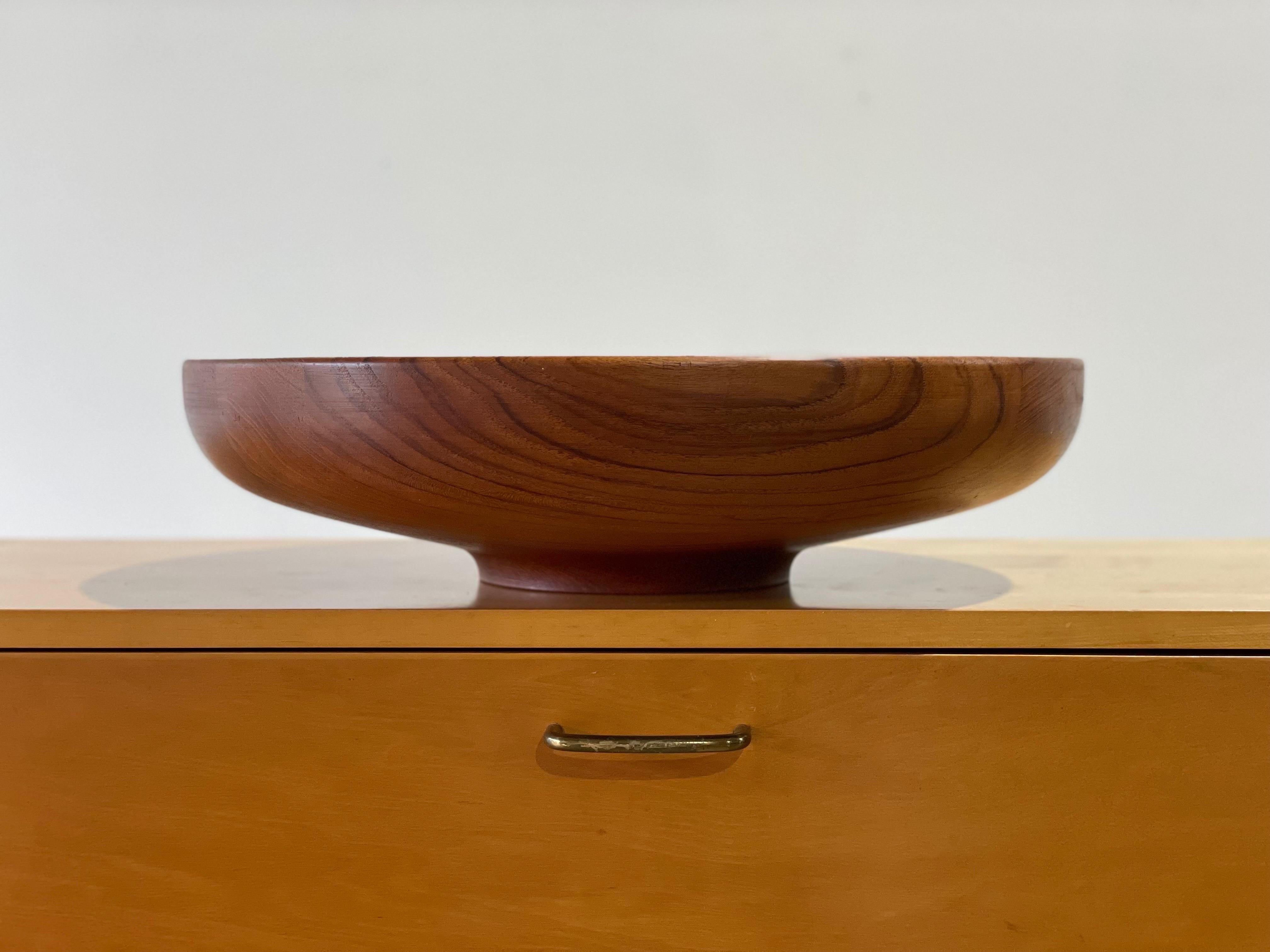 Oversized Henning Koppel for Georg Jensen teak bowl. Staved and turned old growth teak. Gorgeous form and refined silouhette. Excellent original condition - this example looks to have been hardly, if ever used. Our team of in-house craftspeople has