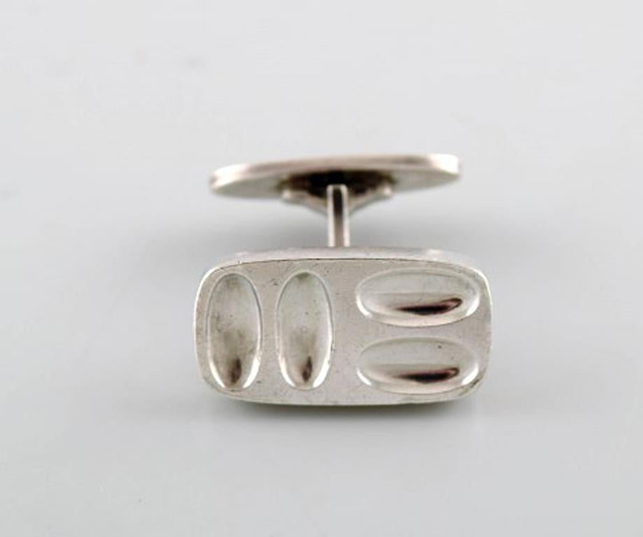 Henning Koppel for Georg Jensen. A pair of modernist cufflinks in sterling silver. Copenhagen's 800th anniversary, 1968.
Model Number: 116.
Stamped.
In very good condition.
Measures: 22 x 12 mm.