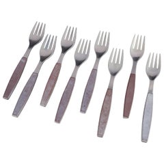Henning Koppel for Georg Jensen. Eight dinner forks in stainless steel, 1970s