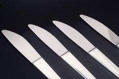 Henning Koppel for Georg Jensen. Four 'Caravel' dinner knives.
