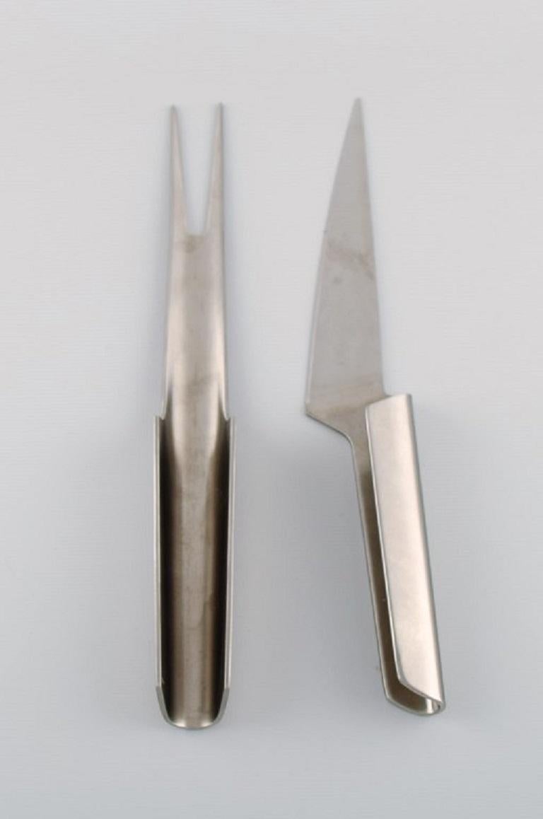 Henning Koppel for Georg Jensen. Rare blue shark carving set in stainless steel.
Length: 32.5 cm.
In excellent condition.
Stamped.