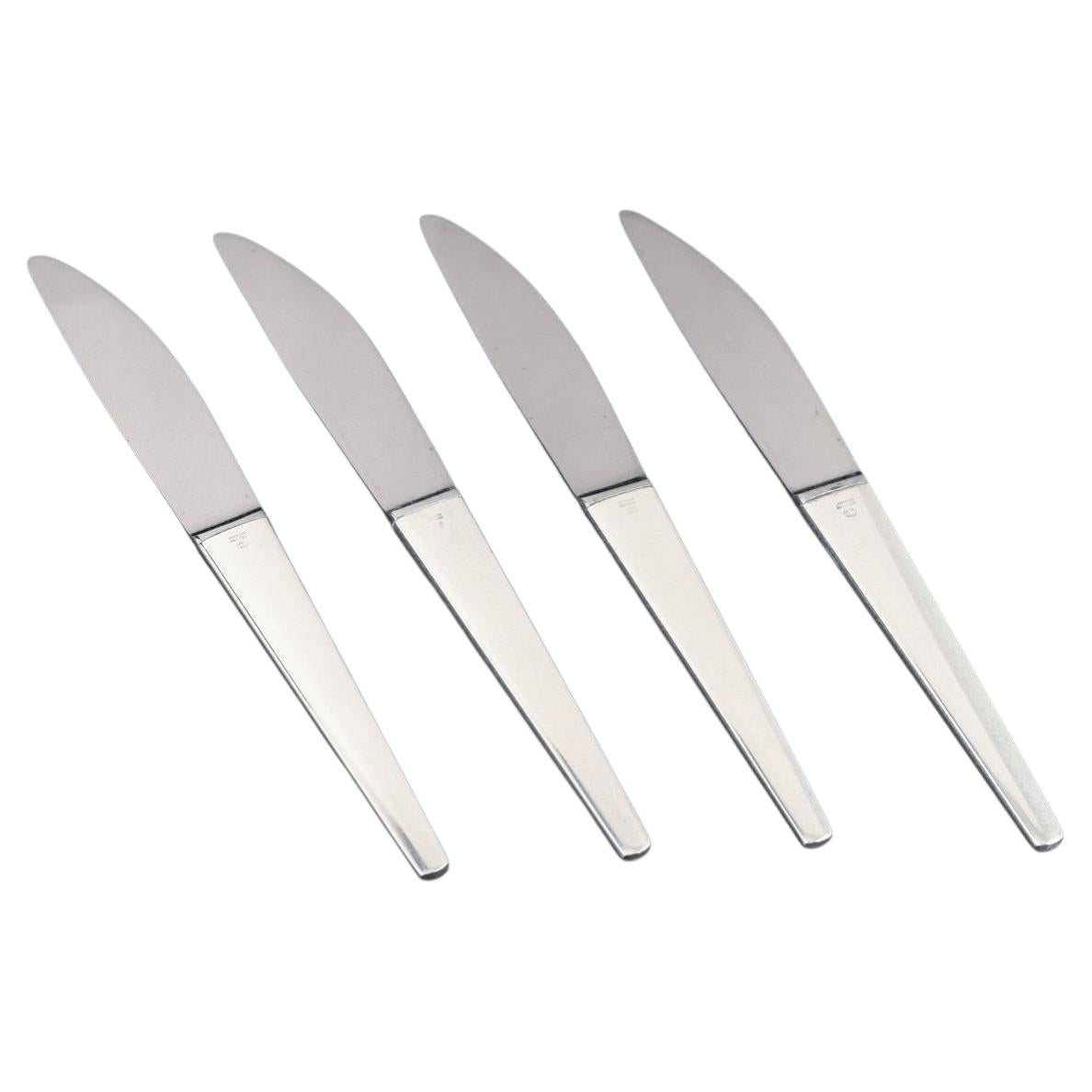 Henning Koppel for Georg Jensen. Set of four 'Caravel' dinner knives. For Sale