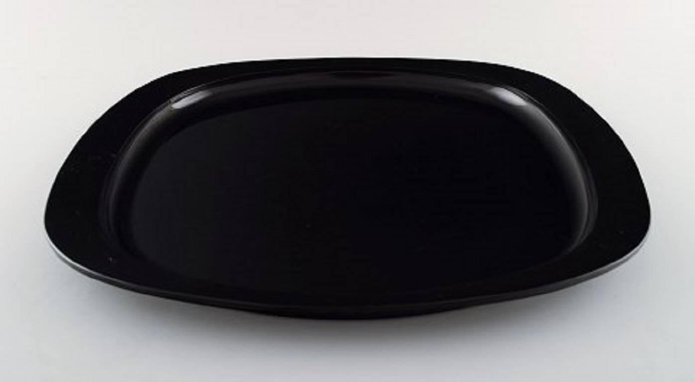 Henning Koppel for Georg Jensen, Tray of black plastic.
Stylish Danish design.
Made and stamped by Georg Jensen.
In perfect condition.
Measures: 35.5 cm. x 29 cm. x 2 cm.