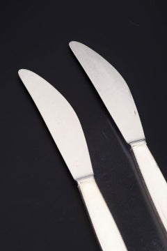 Henning Koppel for Georg Jensen. Two 'Cypress' lunch knives in sterling silver.