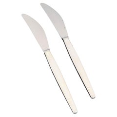 Henning Koppel for Georg Jensen. Two 'Cypress' lunch knives in sterling silver.