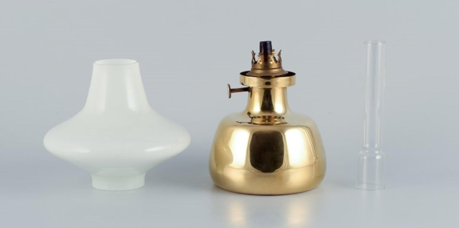 Henning Koppel for Louis Poulsen. Petronella oil lamp in brass and opal glass In Excellent Condition For Sale In Copenhagen, DK