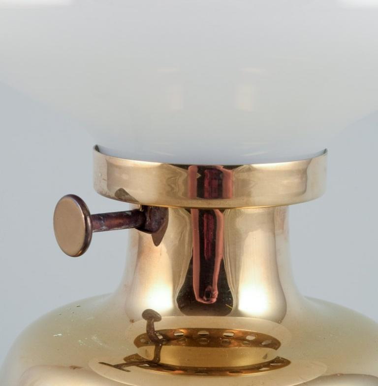 Danish Henning Koppel for Louis Poulsen. Petronella oil lamp in brass. Opal glass shade For Sale