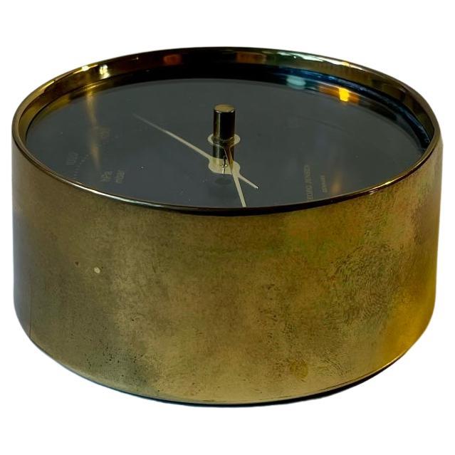 Wall hung brass barometer designed by Henning Koppel and manufactured by Georg Jensen in Denmark during the late 1980s. Mechanically sound and working order. Measurements: 9.5 x 4.7 cm.