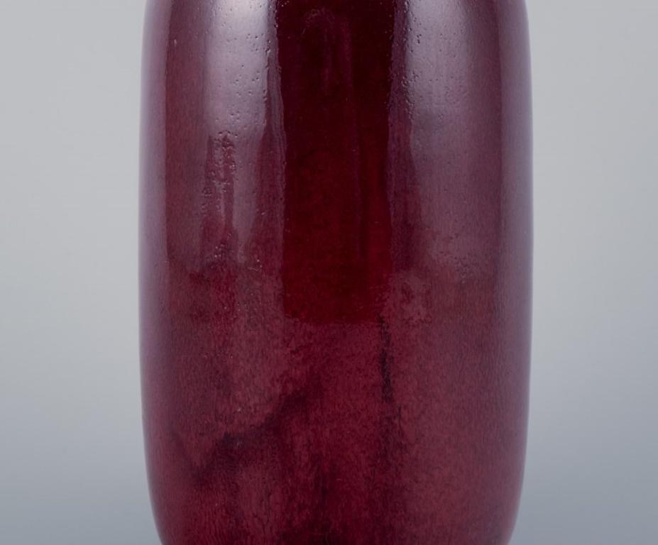 Swedish Henning Nilsson for Höganäs, Sweden. Unique ceramic vase with ox blood glaze For Sale
