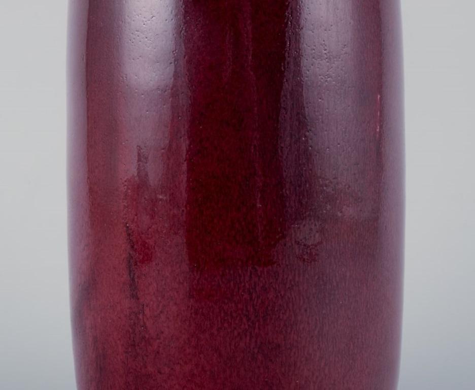 Glazed Henning Nilsson for Höganäs, Sweden. Unique ceramic vase with ox blood glaze For Sale