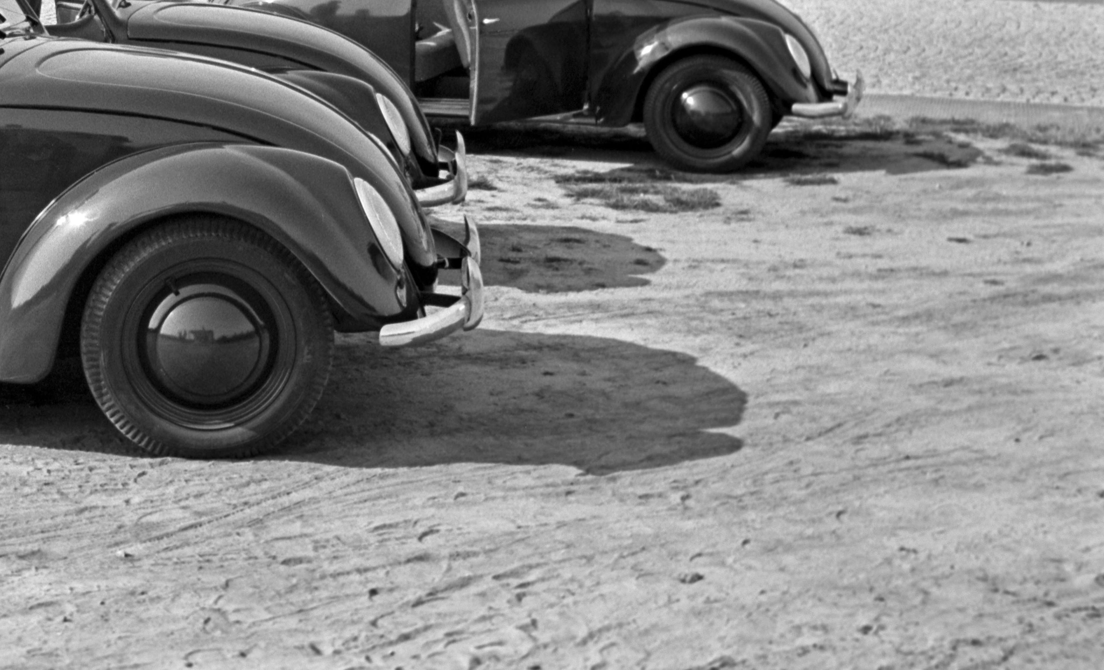 Three models of the Volkswagen beetle parking, Germany 1938 Printed Later  - Photograph by Henning Nolte