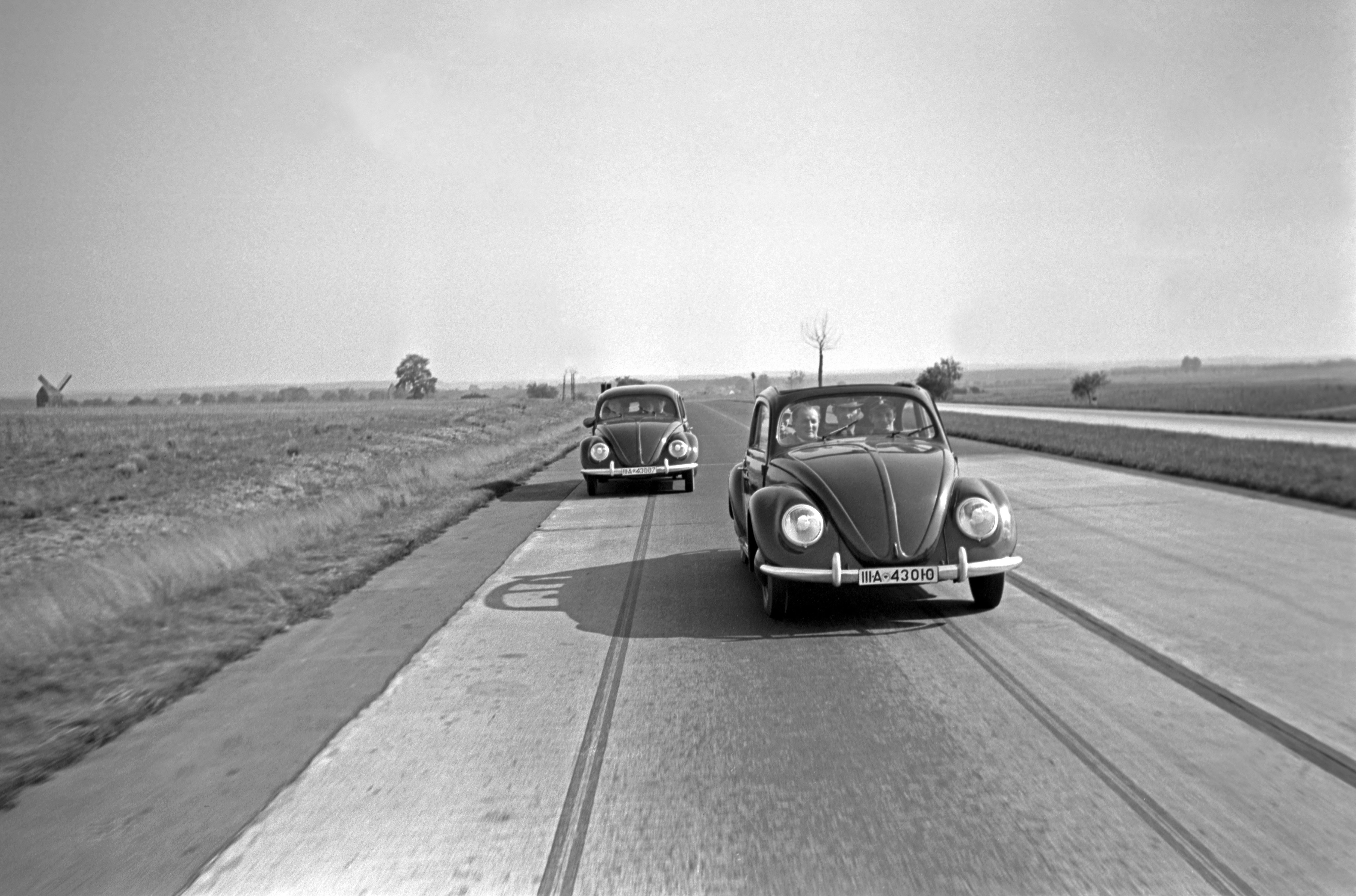 Henning Nolte Black and White Photograph -  Two models of the Volkswagen beetle, Germany 1938 Printed Later 