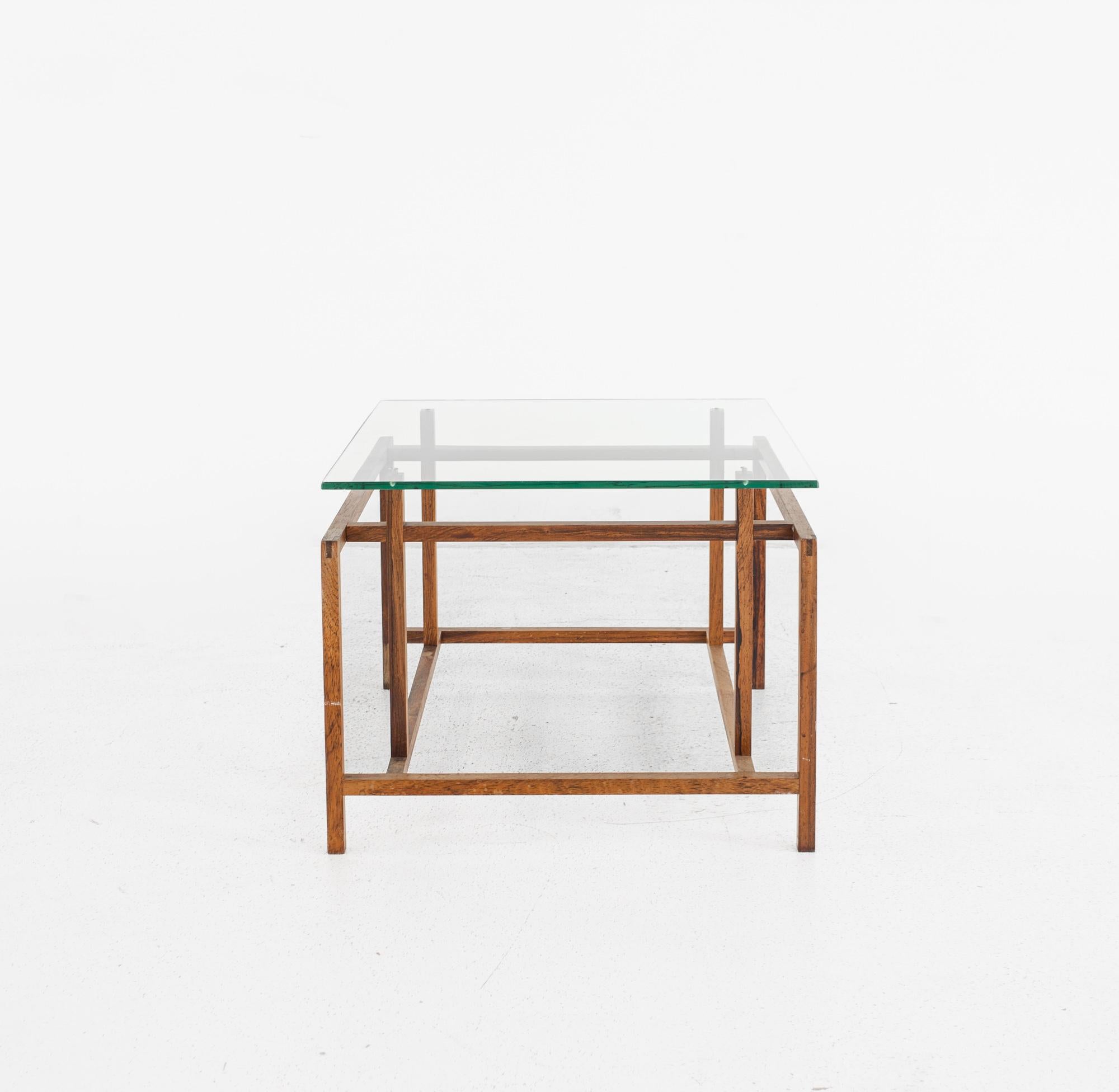 Henning Norgaard for Komfort Mobler mid century rosewood and glass side table

This table measures: 19.5 wide x 19.5 deep x 15.25 inches high

All pieces of furniture can be had in what we call restored vintage condition. That means the piece is