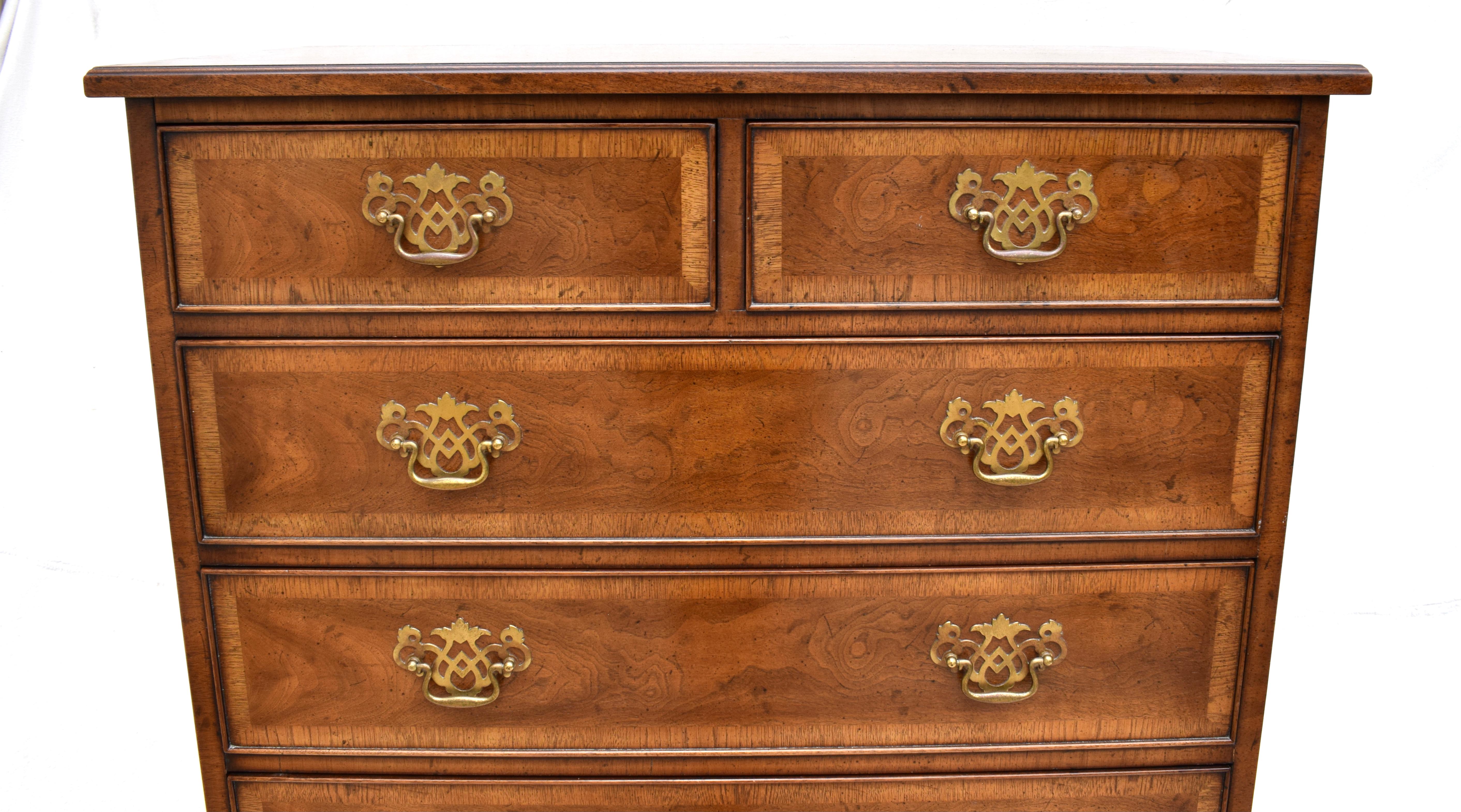 Mid-20th century, Mahogany, Henredon upright chest of drawers having banded and herringbone inlaid borders, seven cockbeaded drawers on straight bracket feet. Beautifully maintained all original finish & hardware. Heirloom quality, branded.