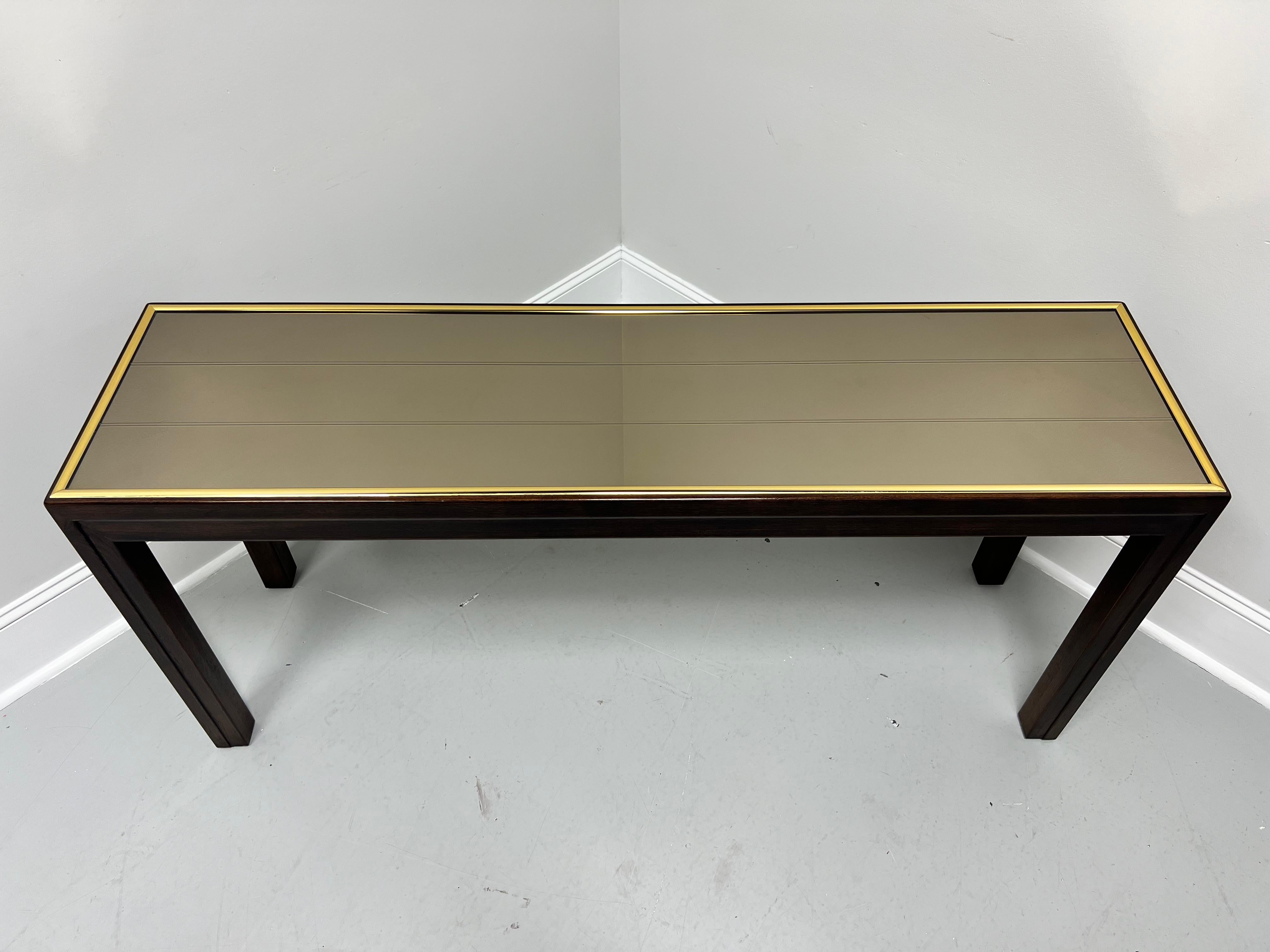 A Contemporary style sofa table by Henredon. Solid oak with a plank design mirrored top, brass banding around edge of top, slightly recessed inward apron, and slightly recessed inward square straight legs. Made in Morganton, North Carolina, USA,