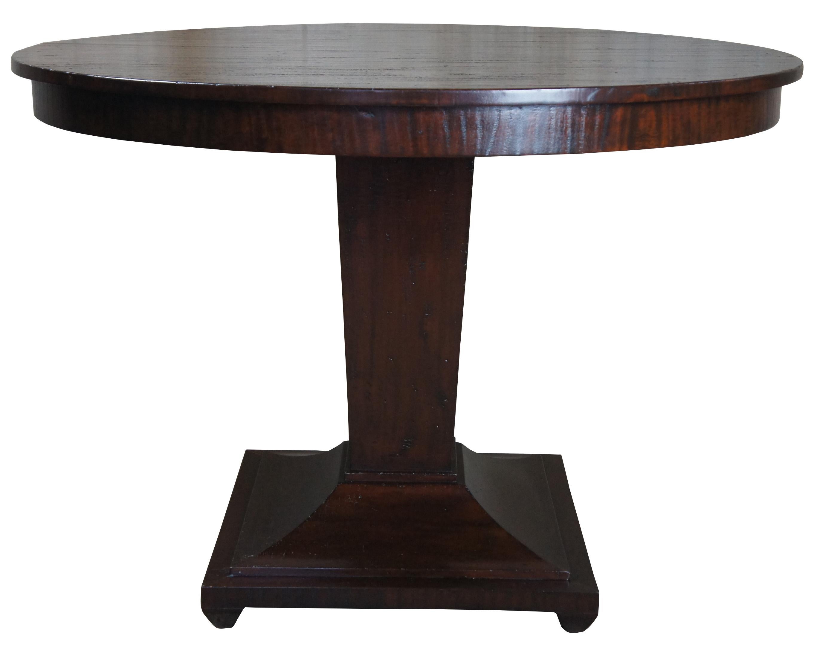 Henredon acquisitions round mahogany center pedestal table traditional modern

Featuring casual, yet attractive designs, this center table makes an excellent contribution to your breakfast nook. A round tabletop and single pedestal with bold lines