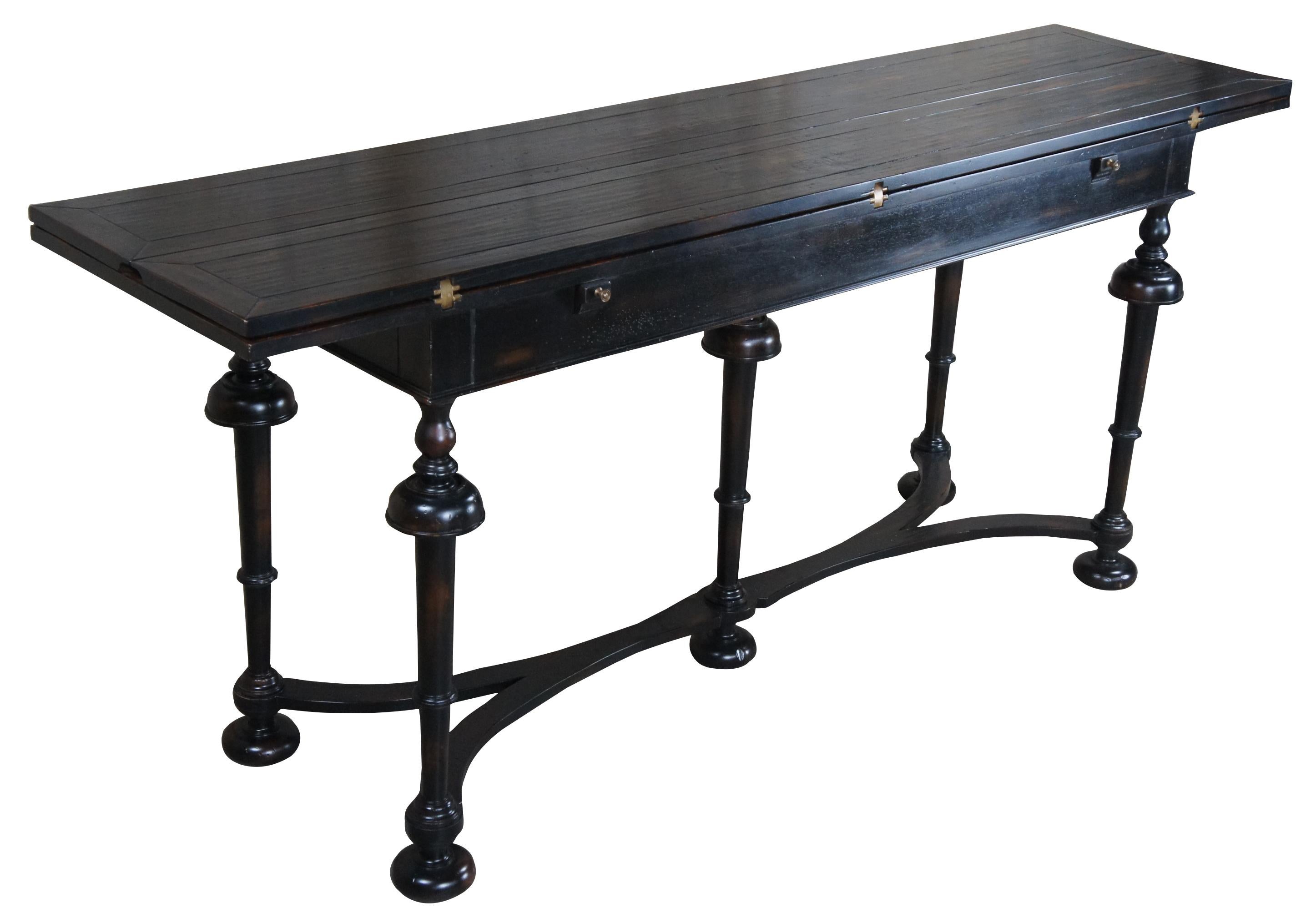 Henredon Acquisitions Townley Console Table with Fold Out Top, #3031-44-661.  Inspired by classic William & Mary style cup and trumpet turned legs leading to bun feet interconnected by stretchers.  Made from mahogany with an distressed and ebonized