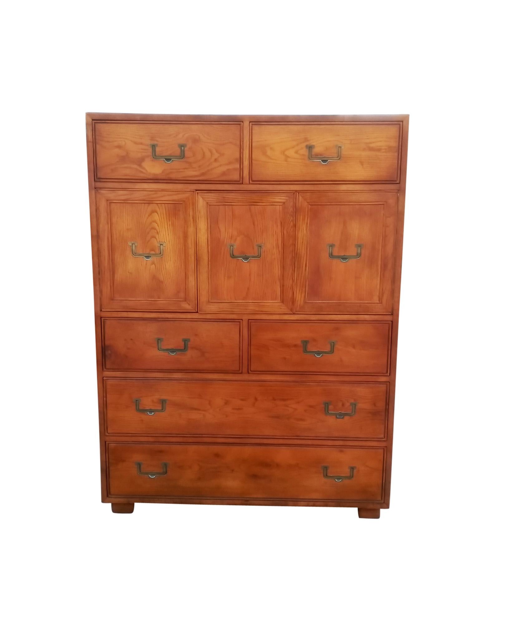 Heirloom-quality Mid-Century Modern tall dresser or Highboy by Henredon, part of the Artefacts collection. Features 2 long drawers, 4 smaller drawers, and 2 doors concealing a divided interior with a single drawer above.

Condition: All drawers