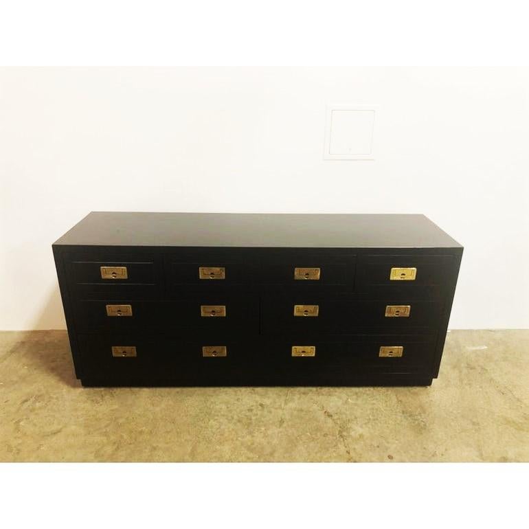 Vintage campaign style dresser by Henredon Scene One collection. Professionally lacquered in black, features a rectangular top above three aligned over two rows of two aligned dovetailed drawers. The fronts are fitted with inset, brass pulls and it