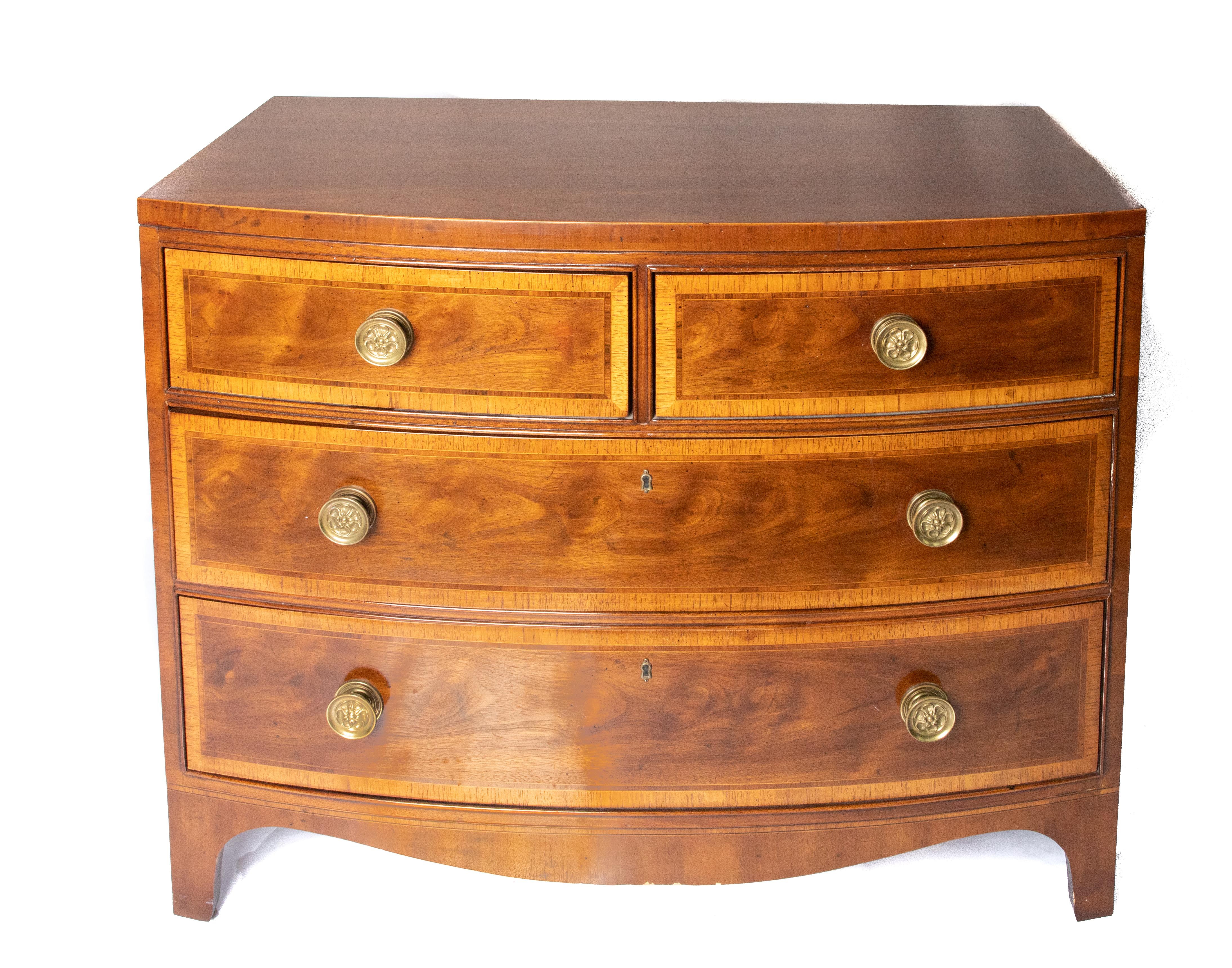 Offering this Gorgeous Henredon bow-front chest. There are a matching pair of these. Starting on the bottom with a bracket foot it rises to the body. The body consist of a two-drawer over two. Both pieces are marked on the inside.