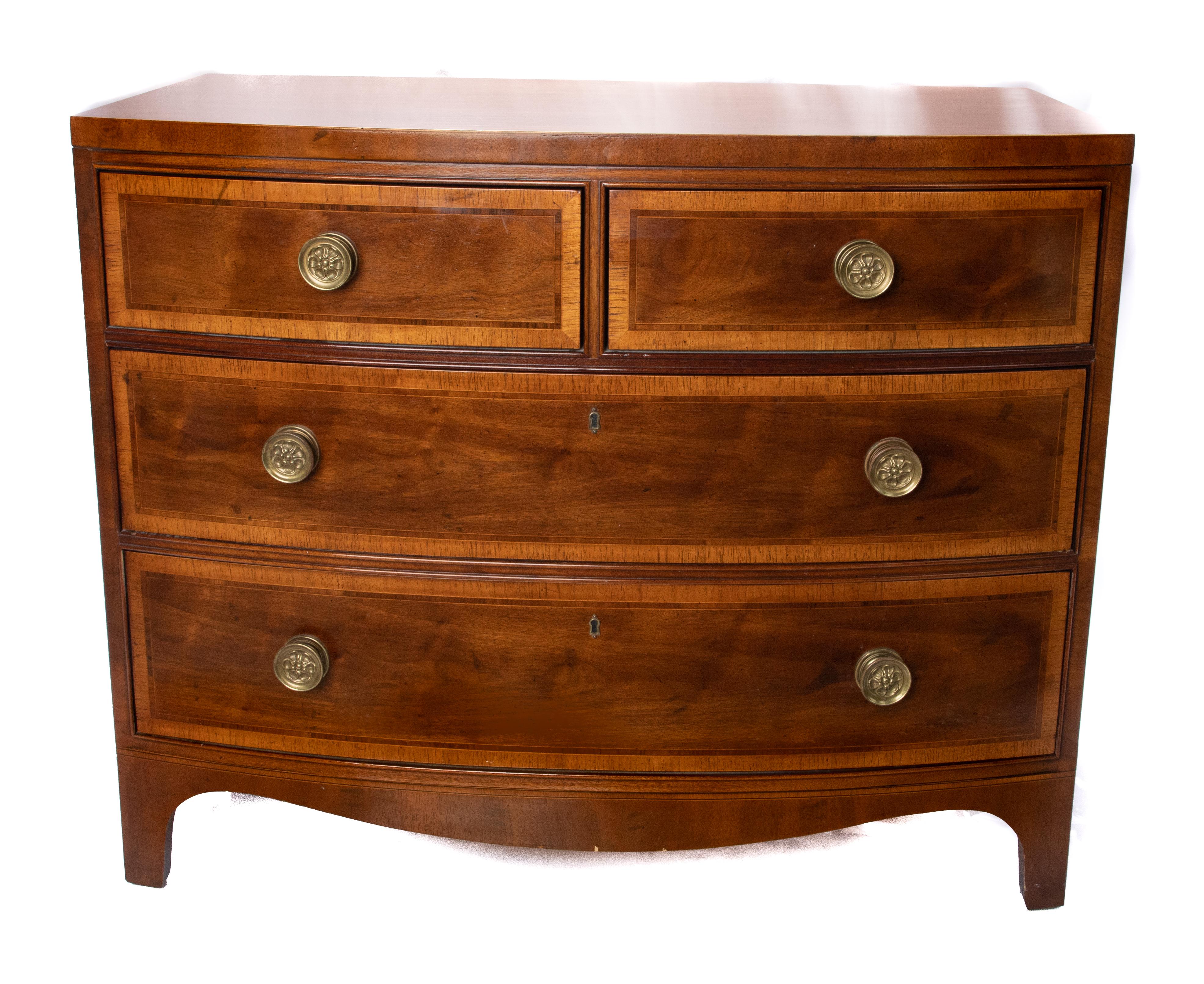 Offering this Gorgeous Henredon bow-front chest. There are a matching pair of these. Starting on the bottom with a bracket foot it rises to the body. The body consist of a two-drawer over two. Both pieces are marked on the inside.