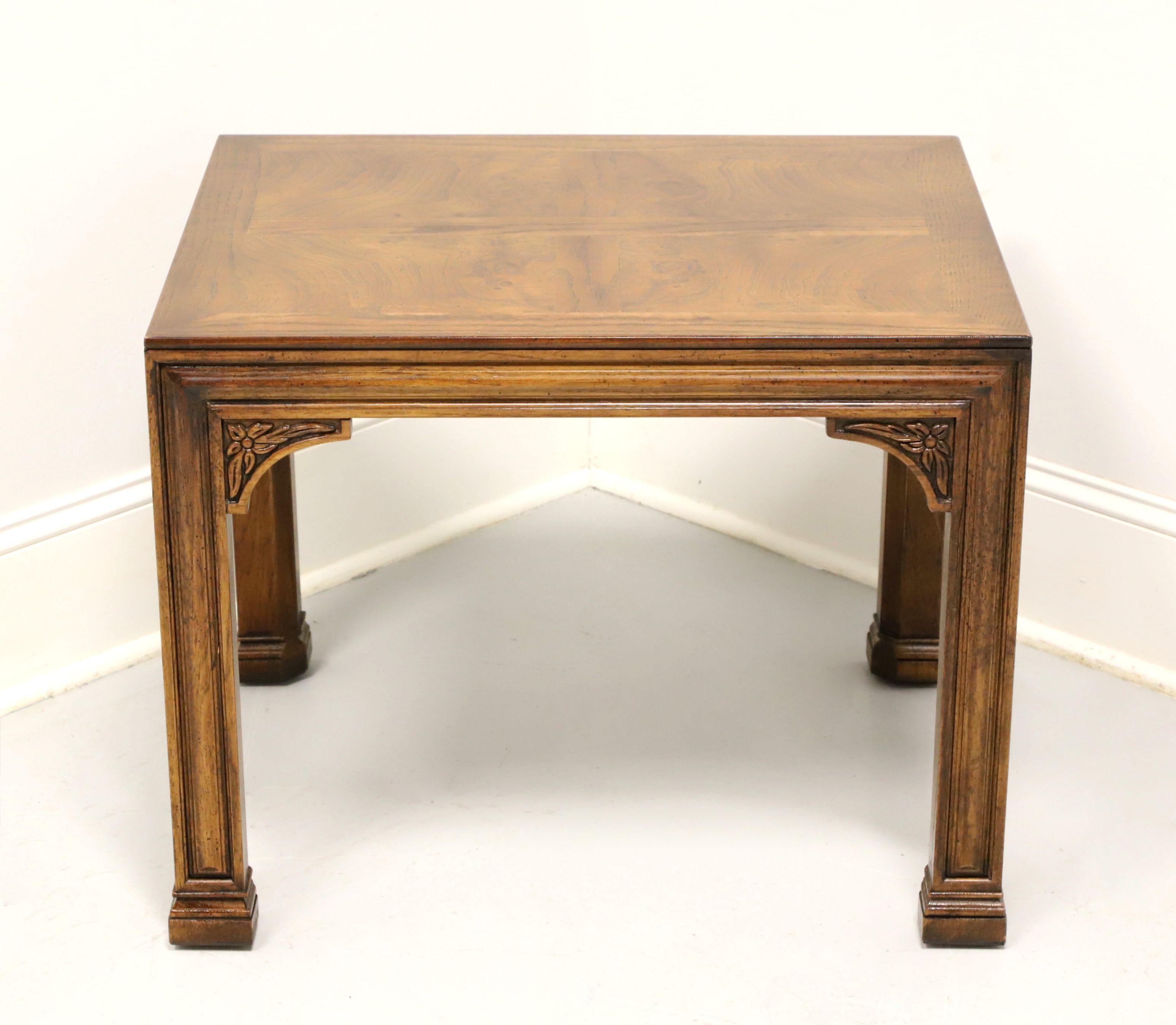 A French influenced rectangular end table by Henredon. Oak with burl oak parquetry design to top, carved apron, decoratively carved corner joints, square straight legs, and block feet. Made in Morganton, North Carolina, USA, circa 1983.

Style #: 41